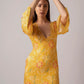 Flirty and playful, this party-wear western dress is perfect for summer events. Delicate lace trim and bell sleeves add elegance while lightweight muslin ensures comfort