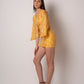 Flirty and playful, this party-wear western dress is perfect for summer events. Delicate lace trim and bell sleeves add elegance while lightweight muslin ensures comfort