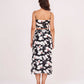 Rear view of the co-ord set, highlighting the back zip closure and clean fall of the floral wrap skirt.
