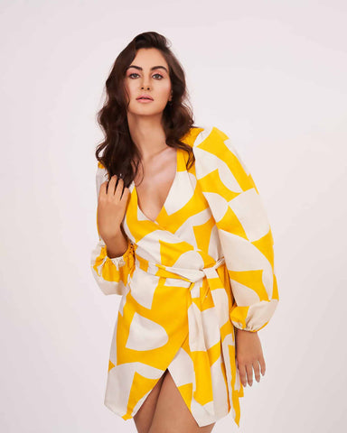 Cotton satin dress featuring full balloon sleeves and a vibrant yellow print