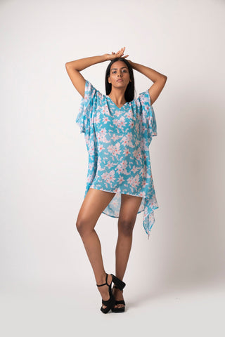 Blue printed faux georgette dress with shell-detailed sleeves, ideal for sundowner events and beach gatherings