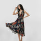 Halter-neck maxi dress with an adjustable tie detail and flowing, relaxed silhouette