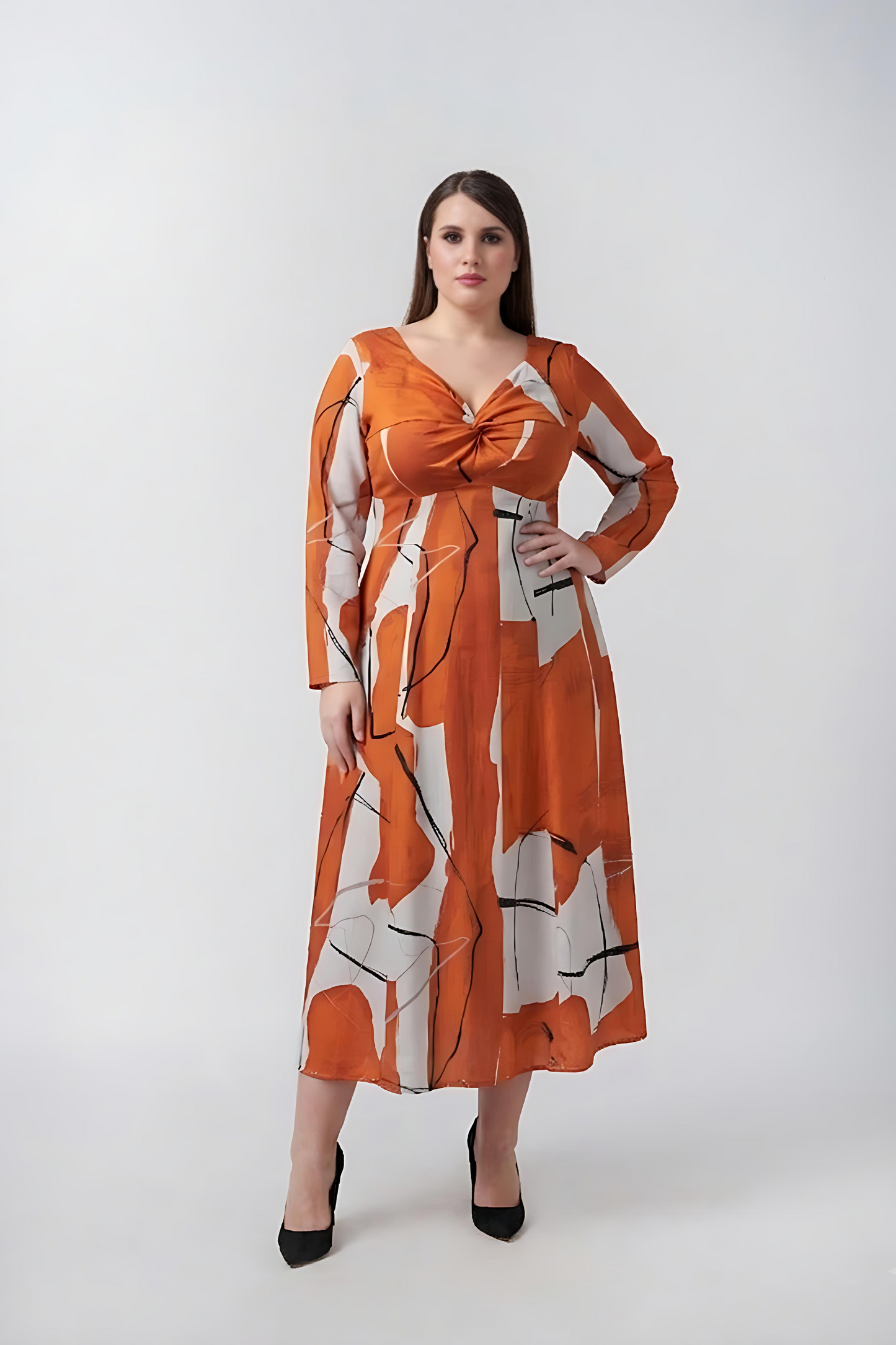 Plus size burnt orange and white abstract cotton satin midi dress with a twisted neckline and full sleeves