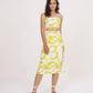 Yellow printed muslin co-ord set with a square-neck top, suitable for summer vacations and daytime outings