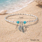 A handcrafted turquoise and gold beaded anklet with a comfortable 7.5cm radius, designed to bring a fresh, earthy vibe to your favorite sandals or holiday outfits.
