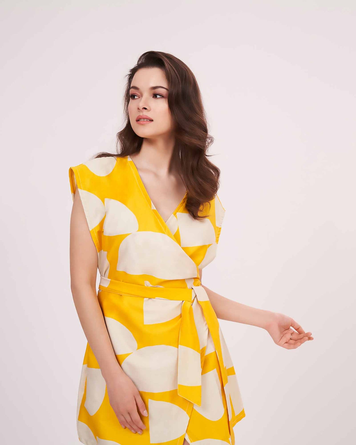 Sleeveless cotton satin wrap dress with a flattering, feminine silhouette