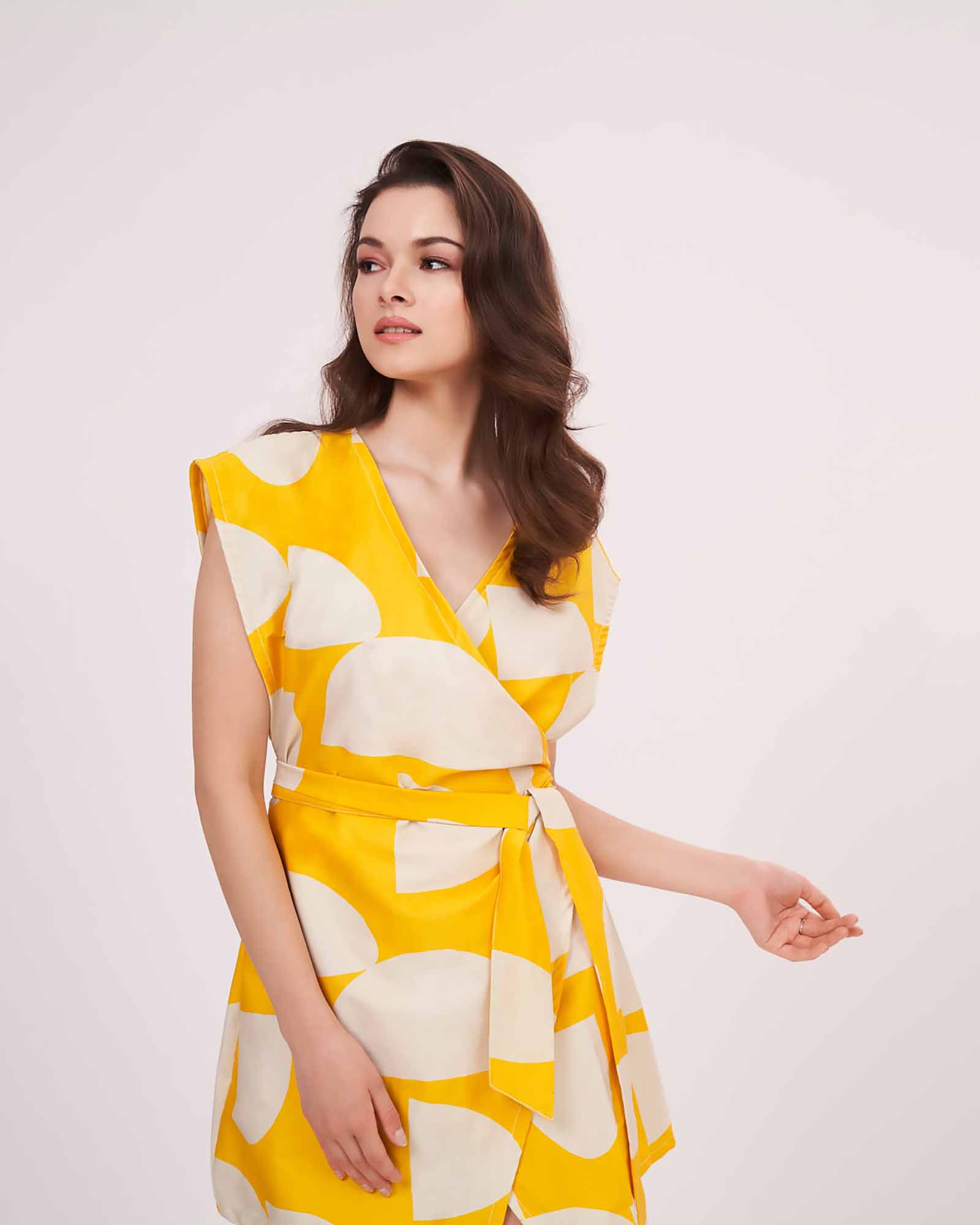 Sleeveless cotton satin wrap dress with a flattering, feminine silhouette