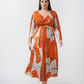 Curve fit cotton satin dress with a twisted neckline and full sleeves, designed to flatter the upper body and add balance