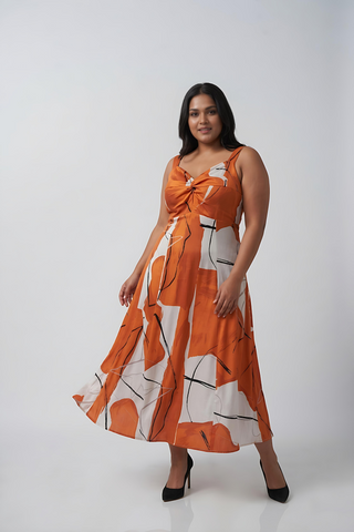 Curve fit cotton satin midi dress with a twisted neckline, designed to frame the upper body beautifully
