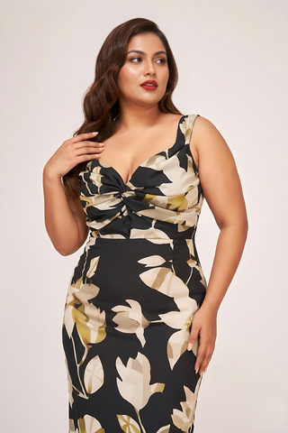 Curve fit floral satin dress with a twisted neckline, designed to frame the upper body beautifully