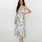 Ankle-length floral halter dress with airy chinon fabric, perfect for elevated occasions and graceful celebrations