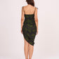 Straight back neckline featuring a concealed central zipper closure and delicate adjustable tie-up shoulder straps.