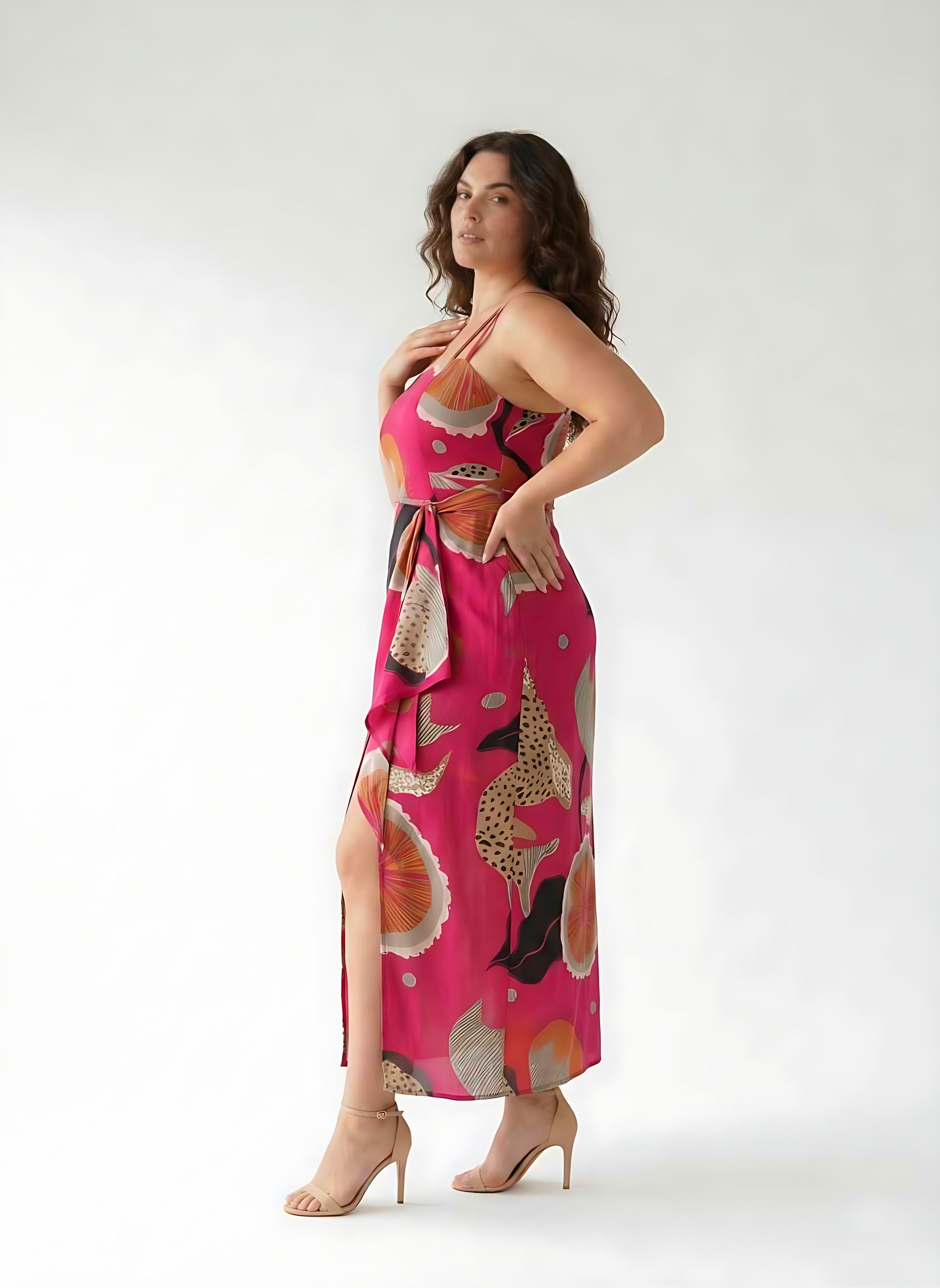 Extended size abstract print dress with a front slit, perfect for parties, vacations, and evening plans