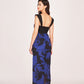 Back view of a long crepe dress with strap shoulders and a back zip closure