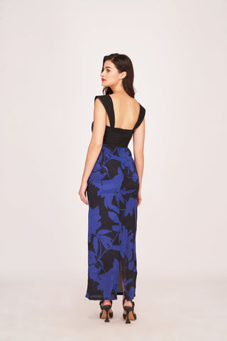 Back view of a long crepe dress with strap shoulders and a back zip closure