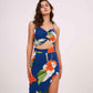 High-waisted maxi skirt highlighting a daring thigh-high side slit for breezy movement and style.