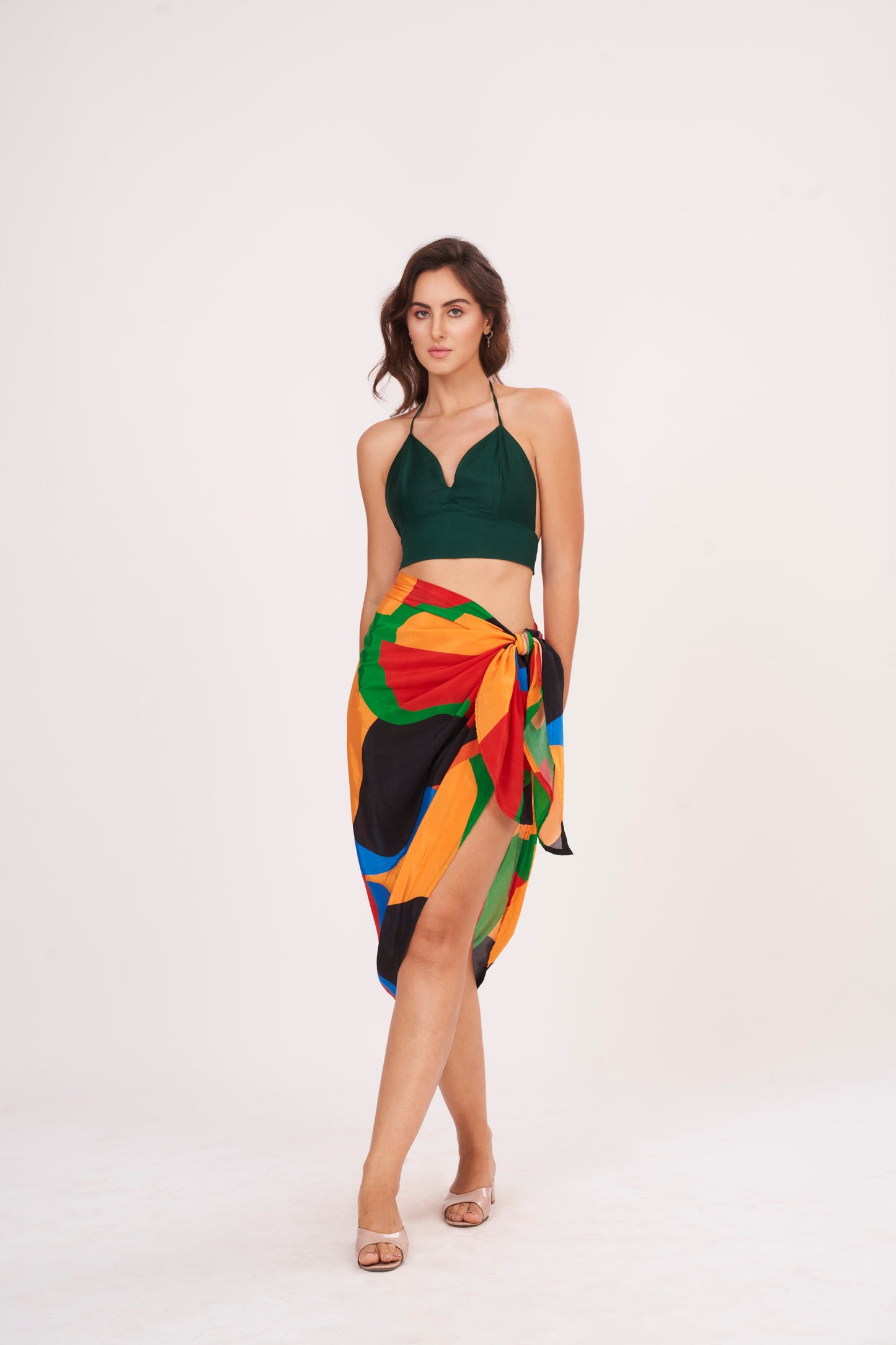 Knee-length cover-up with a breezy high-slit cut and relaxed drape, essential for tropical vacations and pool parties.
