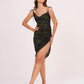 Shoulder-tie midi dress highlighting a daring thigh-high slit and uneven hemline for a contemporary silhouette.