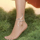 This polished silver sculpted anklet showcases a contemporary "no-clasp" design, making it a versatile and effortless accessory for elevating your wardrobe for a sophisticated holiday look.
