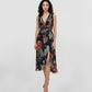 Maxi dress featuring a multicolored abstract print in earthy and vibrant tones