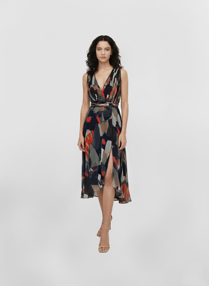 Maxi dress featuring a multicolored abstract print in earthy and vibrant tones