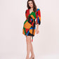 Mini-length silhouette with voluminous three-quarter puff sleeves and a self-tie waist belt for a defined shape.