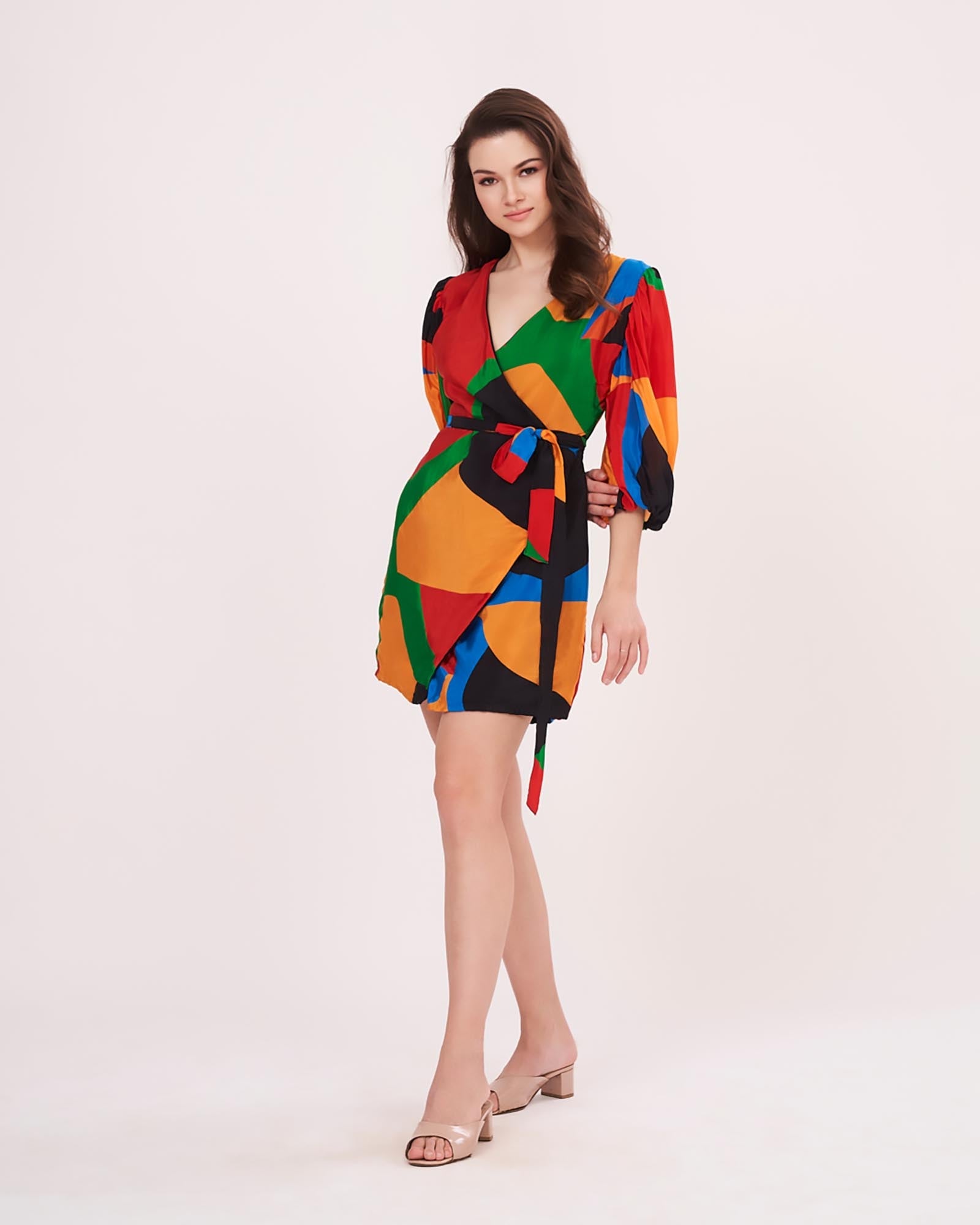 Mini-length silhouette with voluminous three-quarter puff sleeves and a self-tie waist belt for a defined shape.