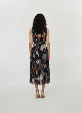 V-shaped back design with and a gathered waistline, showcasing the fluid drape of the lightweight skirt.