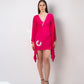 Full front view of pink embroidered kaftan dress with shell detailing and kimono sleeves.