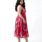 Pink A-line midi dress in lightweight chinon with pleated waist detailing, ideal for effortless vacation styling