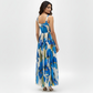 Lightweight Chinon maxi dress with a fitted bodice and softly gathered waist that flows into an airy pleated silhouette.