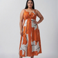 Plus size burnt orange and white abstract cotton satin midi dress with a twisted neckline