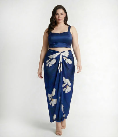 Plus size floral crepe co-ord set with a strap-shoulder top and wrap skirt