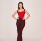 Two-piece set featuring a structured red corset top paired with high-waisted dark maroon trousers. The Rouge Fusion Ensemble offers a sleek, modern silhouette.