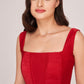 Two-piece crepe set with a structured corset top and coordinating trousers