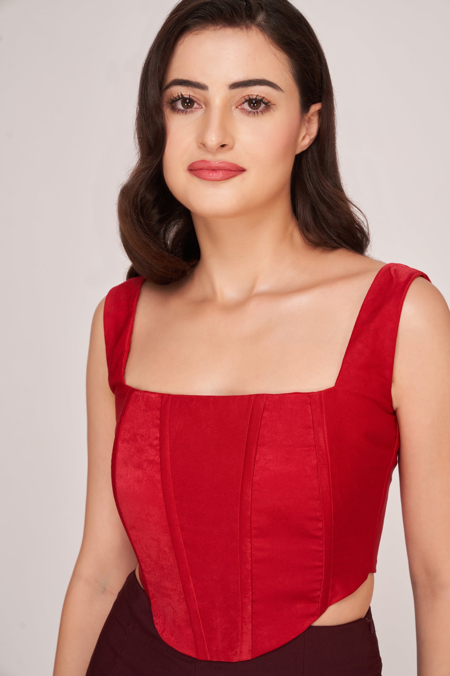 Two-piece crepe set with a structured corset top and coordinating trousers