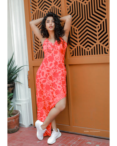 V-neck red muslin dress with strap shoulders, perfect for city strolls, brunches, and warm-weather events