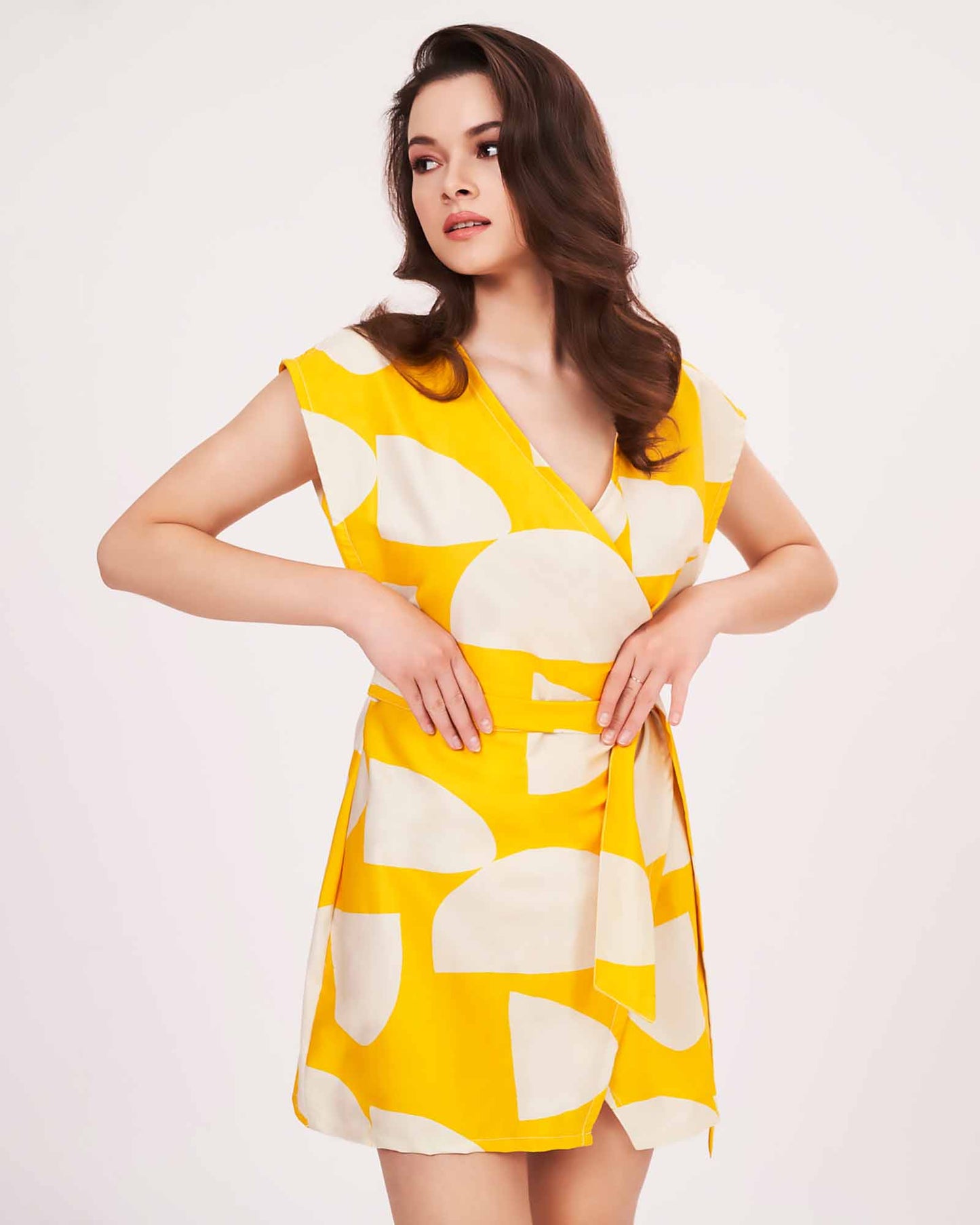 Yellow printed cotton satin wrap dress, suitable for vacations and daytime outings
