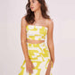 Strappy yellow printed top and skirt set in muslin, ideal for travel, resort wear, and warm-weather evenings