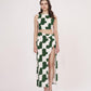 Model standing straight with arms by her side, offering a clear front view of the green abstract co-ord’s structure and fit.