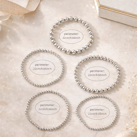 A beautifully coordinated silver beaded anklet set designed to be worn together for a layered statement or individually for a more delicate touch during your tropical getaway.