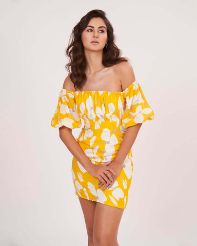 Yellow off-shoulder muslin dress with puff sleeves, ideal for summer vacations and daytime outings